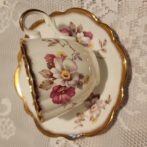 Vintage Taylor And Kent Bone China, Floral Gold-Trimmed Teacup and Saucer Set